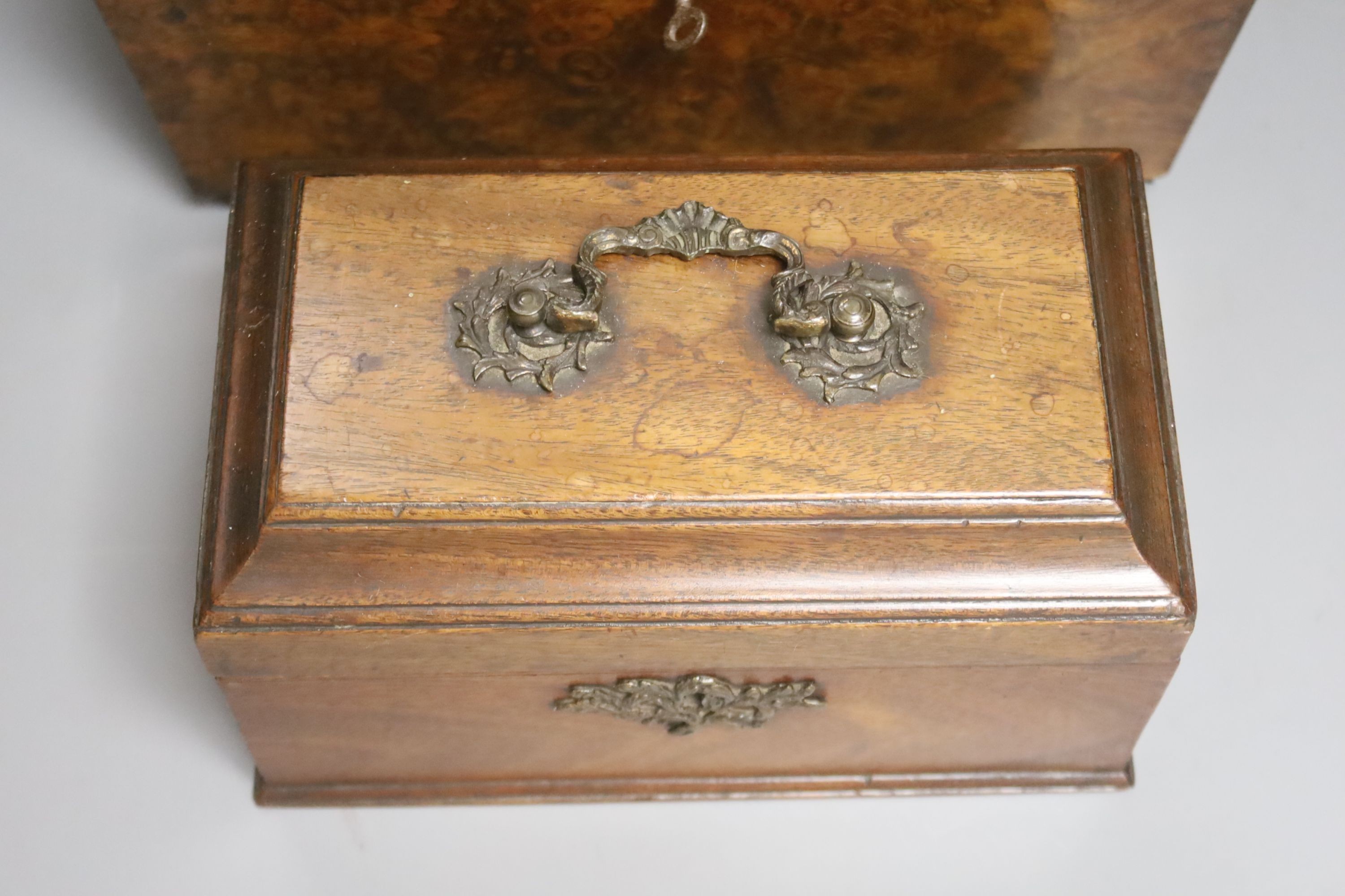 A Victorian burr walnut veneered tea caddy, H 21cm, 31 x 16cm, together with a George III mahogany tea caddy (2)